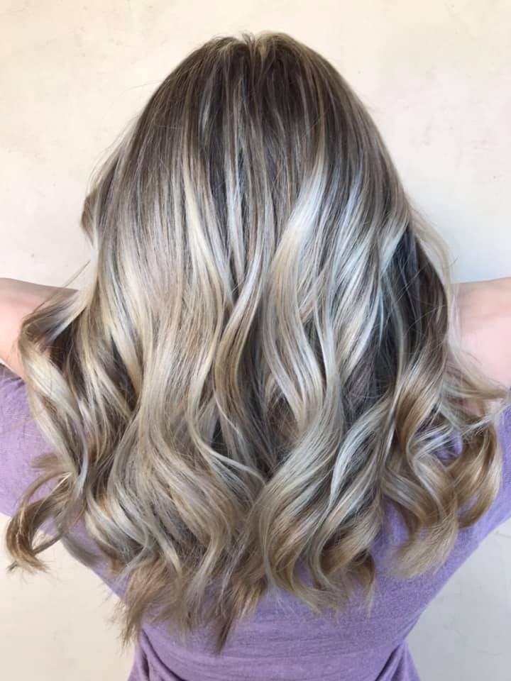 Ash blonde and silver balayage with a smooth cool-toned finish