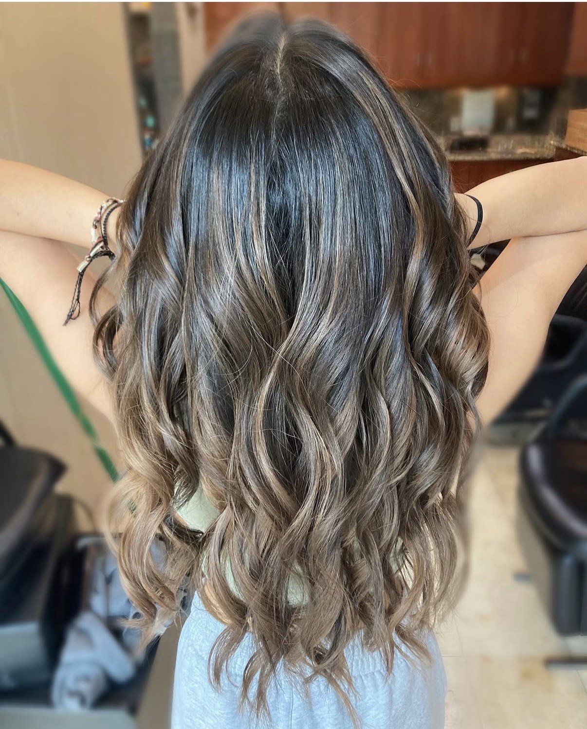 Lived-in blonde balayage with a smudged root for low upkeep